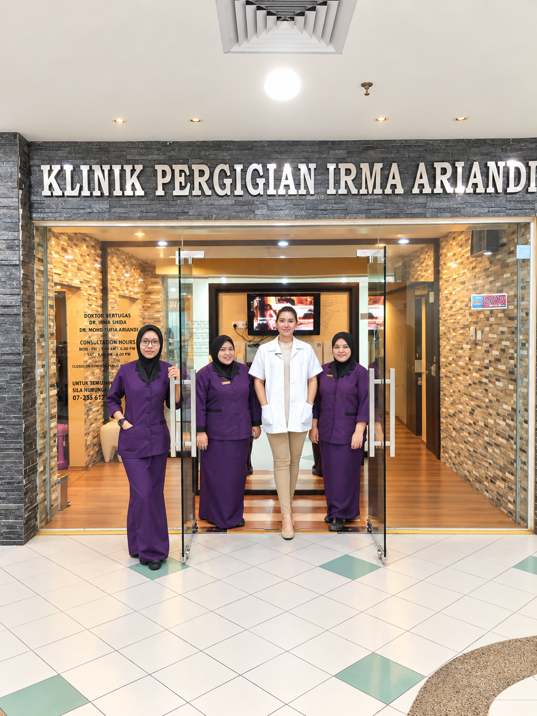 Klinik Pergigian Irma Ariandi — our clinic team at the entrance